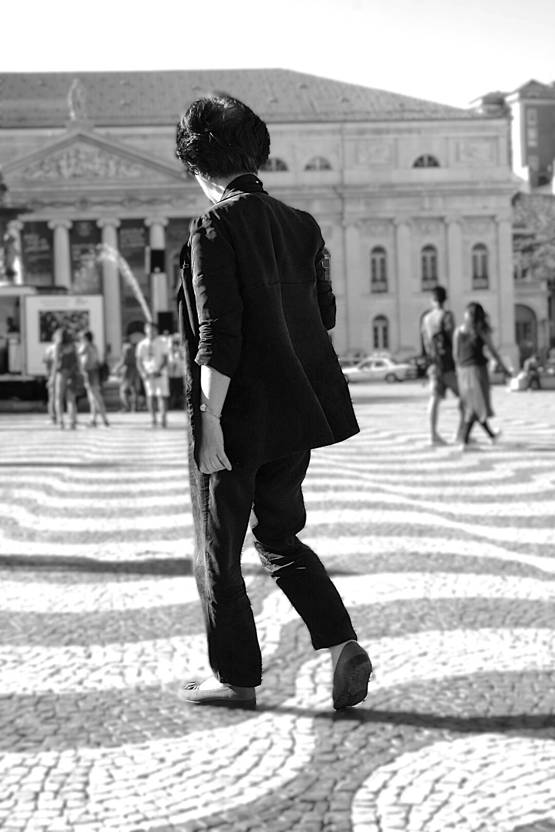 Portrait of a stylish European man in a tailored suit