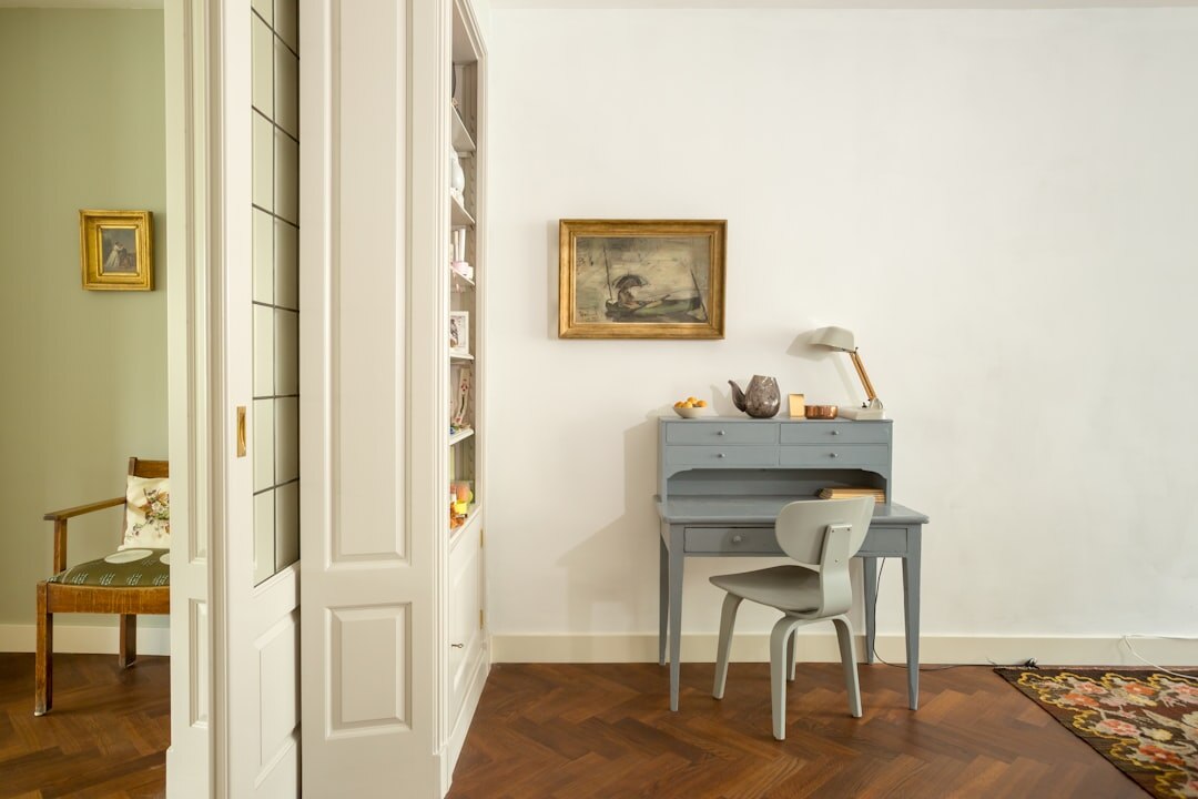 Interior of an elegant editorial atelier with a wooden desk and typewriter