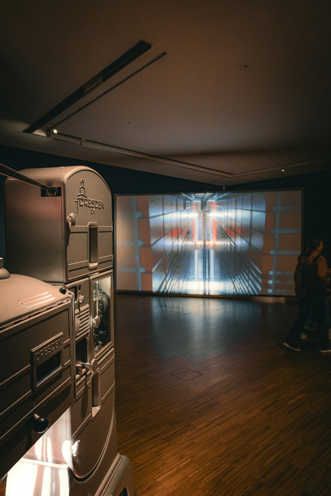Interior of a vintage European cinema hall with red velvet seats